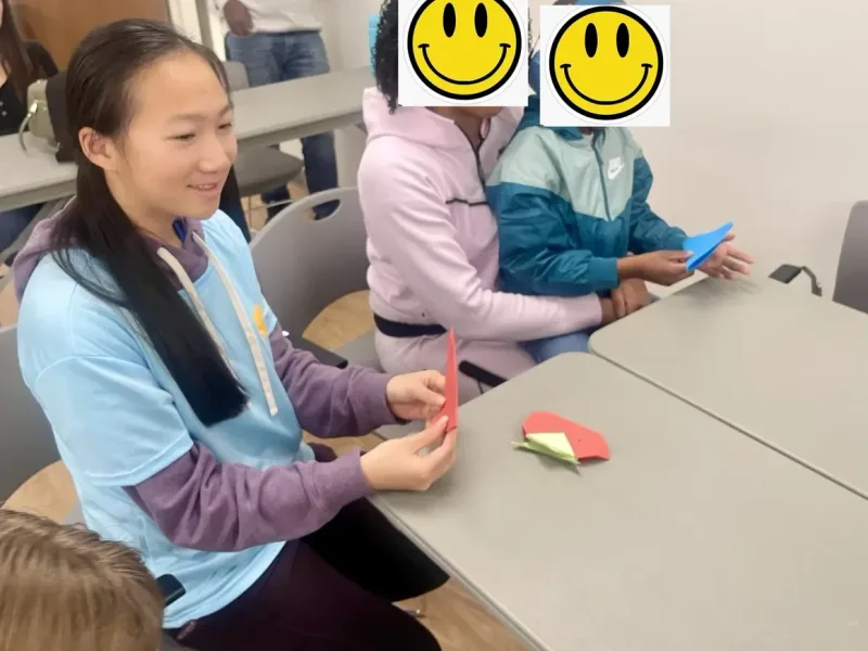 Children doing paper crafts together